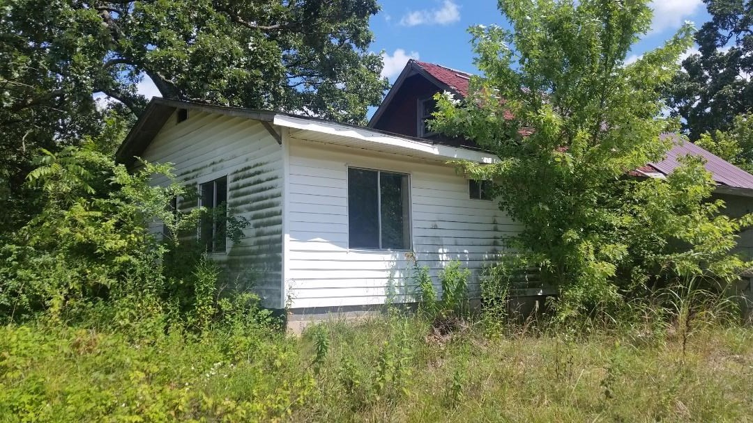 Fixer upper in Lincoln, hard to find, shop behind the house, big chicken house, 1.33 acres (plus the house), sold as is no property disclosure.