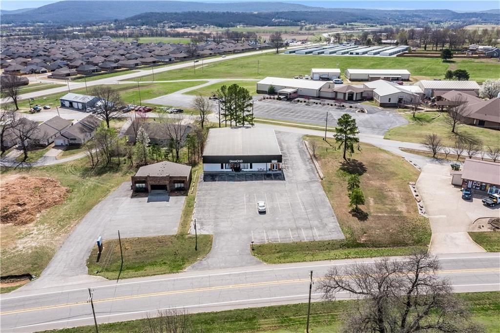 Unlock the potential of this versatile 7,500 sq. ft. warehouse, perfectly positioned just off Business 62 in Prairie Grove. This expansive property offers a flexible open floor plan with high ceilings and durable flooring- ideal for manufacturing, storage, distribution, or other commercial uses. With easy access and a highly visible location, this space is ready to accommodate a wide range of business ventures. Whether you're expanding operations or launching a new endeavor, this property provides the blank canvas your business needs to thrive. Bring your vision to life in a space designed for growth. Contact us today to schedule your private tour!