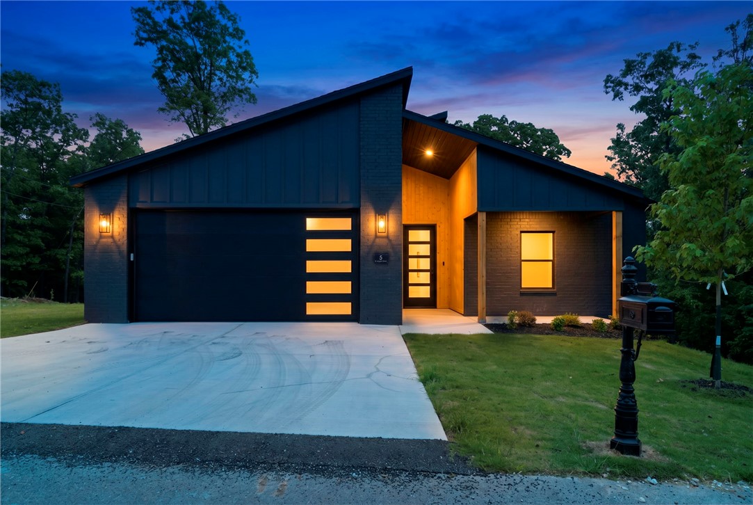 This new home in Bentonville School District, located on a quiet road in Bella Vista, nestled on a corner lot. The lot is flat, perfect for outdoor enjoyment. Enjoy a .1 mile walk to Taylor homestead hiking and biking trail and nature while being just minutes from all Northwest Arkansas. This thoughtfully designed home features quartz countertops, upgraded lighting, hot water recirculation system, and quality finishes throughout. Relax on the covered porch and enjoy the natural surroundings. Also enjoy access to community pools, lakes, gyms, and boat launches.