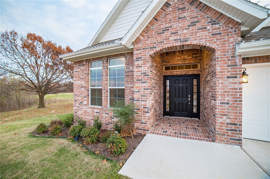 Stunning home by Riggins, just one year old! Wonderful location and community amenities that include community pool, basketball court, baseball field, and clubhouse. Home has upgraded appliance package by Frigidaire Gallery Series, gas convection oven, 2 inch blinds on all windows, hand-scraped hardwoods, crown molding, central vac, security system, and granite, to name a few! Wonderful, large lot and one of the most private locations in the subdivision. Even better in person than in pictures!