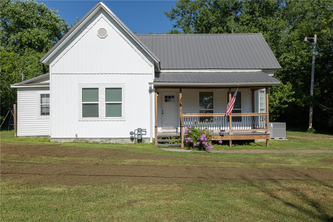 Charming historical remodeled farm house located on a 0.41 acre, more or less, lot in the heart of Lincoln. With 3 bedrooms and 2 bathrooms all on one level, this home is move in ready. The kitchen has LVP flooring, butcher block counters and ample space to entertain. The large living room has a gas fireplace and an attached flex room for additional living room, office or play area. The primary suite features a custom walk-in tile shower and closet. The covered back porch is perfect for grilling, entertaining and/or enjoying a peaceful morning cup of coffee. The large lot is prime for a garden, shop building, ADU or play yard for the family. Near everything in Lincoln yet still has a country feel. RD Loan eligible. Prairie Grove Zing broadband internet.