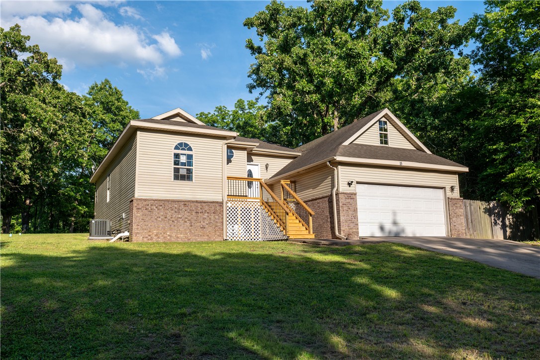 House with an extra lot, total 0.56 acre, 3 Bedrooms 2 bathrooms, 9 foot ceilings, large living area, large master bedroom, new front porch, refrigerator, washer and dryer.