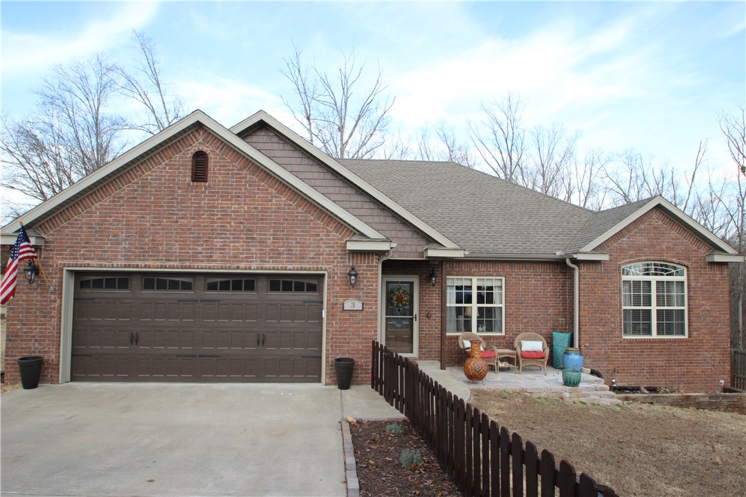 What a charming, warm and inviting home. Natural light fills the beautifully remolded family room with a newly installed stone fireplace as the centerpiece. Interior has been completely updated with new paint, light fixtures, flooring, appliances and more. Exterior gained a new garage door, storm door, light fixtures, stain and more. Fully fenced backed yard and a freshly stained picket fence around the front. This home is certainly ready for its new owner.