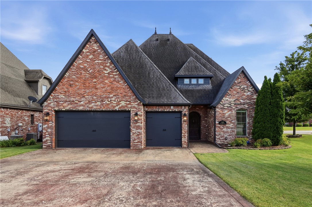 Welcome home to this elegant 4 bedroom, 3.5 bathroom home situated on a corner lot just down the street from Bentonville schools and only 1 mile from Coler Mountain Bike Preserve. Step inside to find fresh paint and durable wood-look flooring throughout the home for easy maintenance. The eat-in kitchen features an island and walk-in pantry with abundant storage, new flooring, an updated backsplash, and a striking tongue-and-groove ceiling. The main floor primary suite offers a private retreat with a luxurious bathroom, and a spacious closet with direct access to the laundry room. A dedicated office space provides the perfect setup for remote work or study. Upstairs are 3 bedrooms and a newly added bonus/flex room that offers endless possibilities to suit your needs. Outside, the full brick exterior and professional landscaping adds curb appeal, while the fenced backyard has space to relax or entertain. A 3-car garage rounds out this move-in-ready home, offering ample storage and parking.
