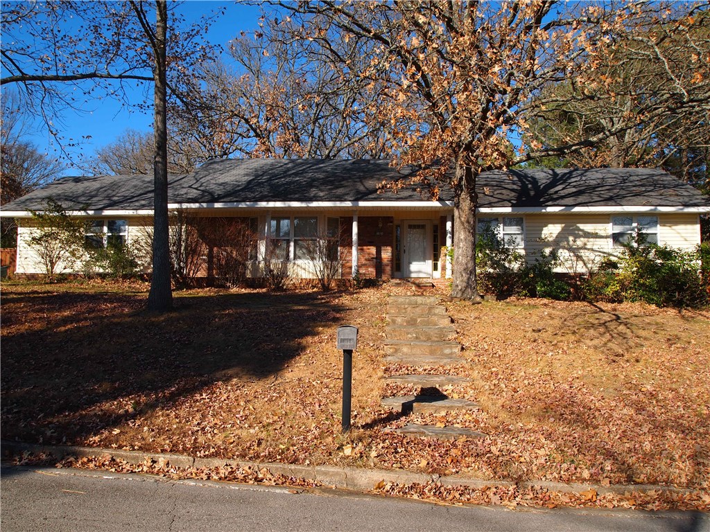 Fantastic corner lot in the heart of East Fayetteville.  Home boasts two living areas, eat-in kitchen, and spacious master suite.  Convenient to all of the wonderful amenities Fayetteville has to offer.  Large privacy fenced back yard.  Fixer Upper **Sold as-is**.  Seller is requesting cash or in-house conventional financing only.