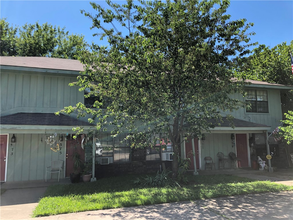 2 bedroom, 1.5 bath townhome. Wood floors, all appliances, fenced backyard, new paint, carpet upstairs, very clean/nice. Great neighbors.