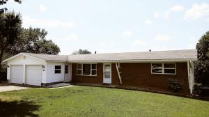 Spacious well cared for home nestled in a quiet neighborhood on a dead end street. Oversized 2 car garage with workshop area. Newer vinyl windows throughout, newer AC unit and a coil installed in 2015 with furnace in 2009. Massive covered deck and mostly chain link fenced yard. Partially finished full basement which could double your Sq Footage with a little work or would be a great Mother in Law Quarters.