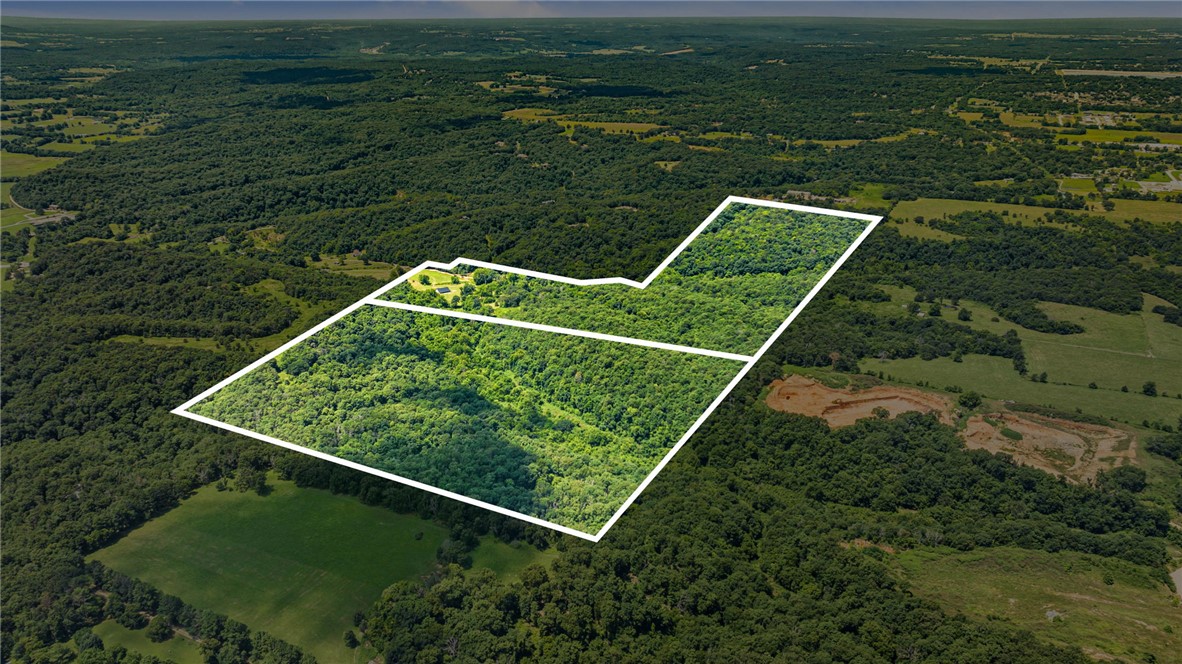 Discover the possibilities with this exceptional 140-acre property in Siloam Springs. Offering a rare combination of privacy, convenience, and investment potential, this tract is ideal for residential development, a private estate, or recreational use. The property features two scenic ponds, an existing well, and gently rolling acreage with plenty of room to bring your vision to life. Enjoy the peace of country living while remaining just minutes from shopping, dining, schools, and everyday conveniences in one of Northwest Arkansas’ growing communities. Whether you’re a developer, investor, or someone looking for a one-of-a-kind property, this is an opportunity you won’t want to miss.