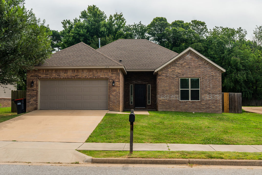 Style, Space & Convenience in North Springdale! Beautiful 4 bedroom & 2 bathroom home conveniently located near Hwy 71B with easy access to shopping, dining, & schools. The open floor plan features 10-ft ceilings, crown molding, & gorgeous ceramic tile flooring throughout the main living areas. The kitchen offers granite countertops, stainless steel appliances, tile backsplash, beautiful cabinetry, & plenty of prep space. The split-bedroom layout provides a private primary suite with dual vanities, soaking tub, tiled walk-in shower, & two walk-in closets. Three additional bedrooms share a full bath, & the nearby utility room adds everyday convenience. Move-in ready with modern finishes, functional design, & an excellent location!