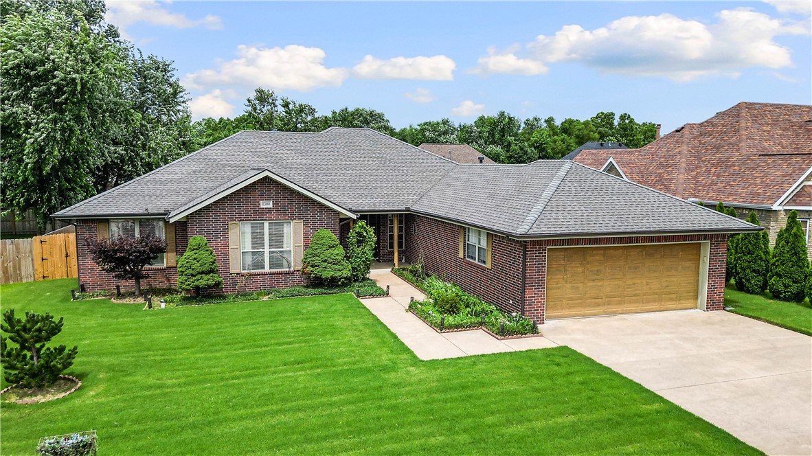 Positioned in one of Rogers' most convenient locations, this all-brick home places you just minutes from shopping, restaurants, interstate access, and only 10 minutes from the new Walmart campus. The well-designed floor plan offers multiple gathering spaces with two living areas, a formal dining room, and a dedicated office. Recent updates include LVP flooring, updated kitchen appliances, a tankless water heater, and a new HVAC system installed in 2024. The spacious primary suite is tucked away for privacy and features a large en suite bath with double vanities, jetted tub, walk-in shower, and three closet spaces. The kitchen provides ample storage and workspace while remaining connected to the main living areas. Outdoors, the covered back patio creates an ideal setting for morning coffee, evening meals, or weekend get-togethers. Combining major system updates, versatile living spaces, and a sought-after Rogers location, this home offers easy access to everything Northwest Arkansas has to offer.