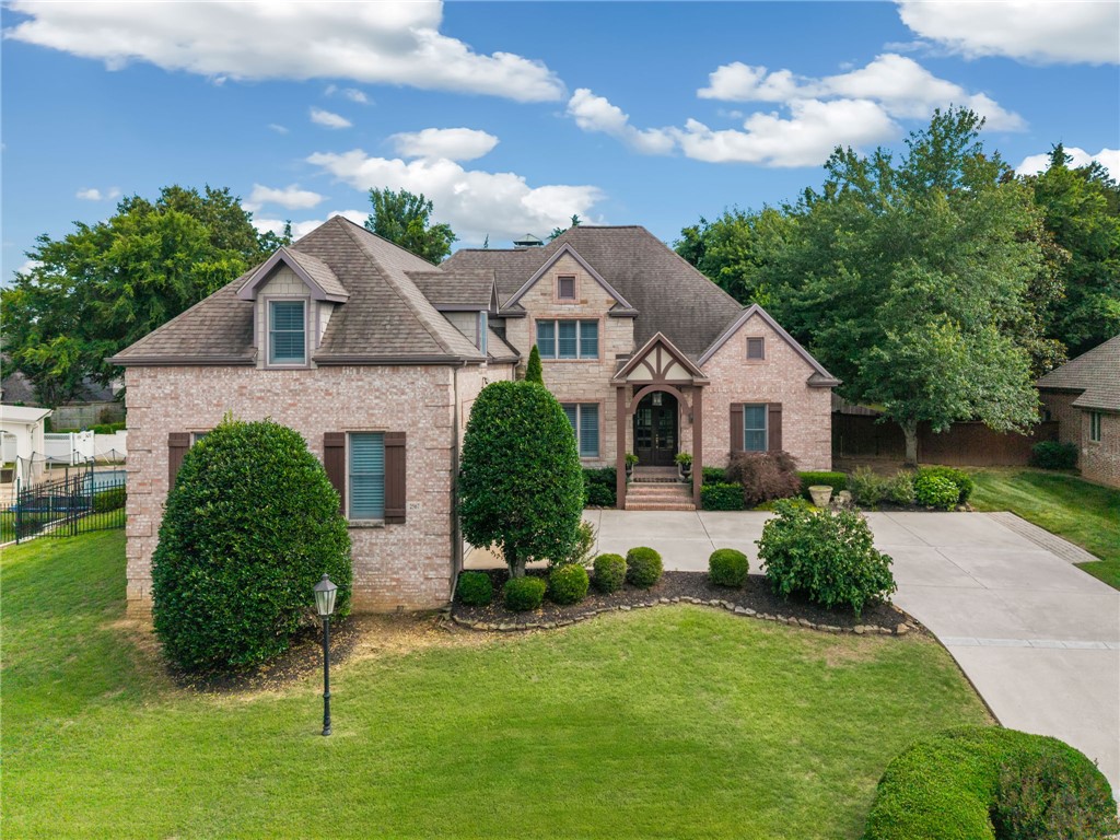 Located in the sought-after Candlewood neighborhood in East Fayetteville, this 3-bedroom, 3.5-bath home with bonus room (or 4th bedroom) offers spacious rooms, thoughtful updates, and a neighborhood trail connection to Vandergriff + McNair. Renovated in 2018, the interior features hardwood flooring, wooden louvered shutters, and an open kitchen with custom ceiling-height cabinets, granite countertops, high-end stainless steel appliances, and a built-in desk nook. The main-level primary suite includes wood floors, an updated bath, and a large, naturally lit walk-in closet. Upstairs, one bedroom has an en suite bath and large walk-in closet; a second bedroom and the bonus room share a full bath with separate vanities and also enjoy oversized closets. One upstairs closet is a fun kids’ nook or potential future walk-in. The main living area opens to a large covered patio with outdoor fireplace and a private backyard. An oversized two-car garage provides excellent storage. Stop by our Open House, Sunday 2:00 - 4:00 PM!