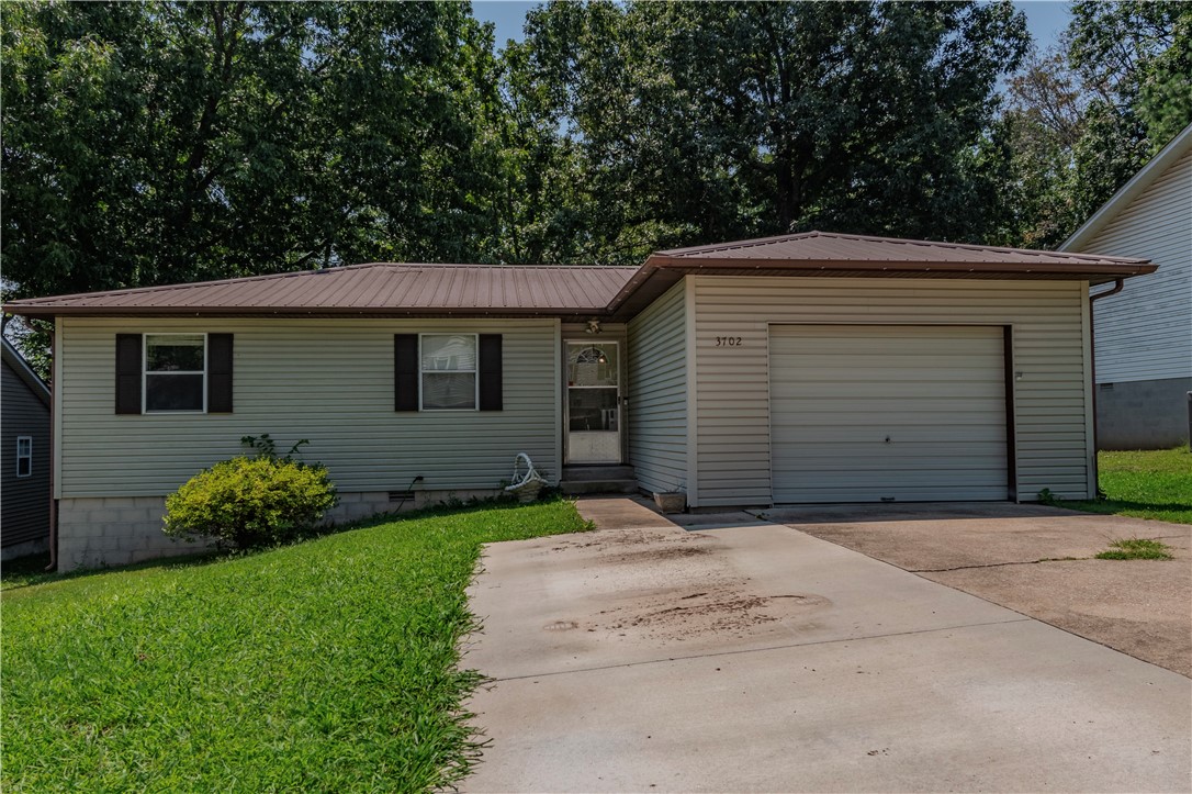 Discover this low-maintenance 3 BR home on Harrison's North edge, just minutes from Walmart. Featuring vinyl siding, a metal roof, insulated windows. Recent updates include new flooring, fresh paint, and a lovely deck (12x24) perfect for entertaining. Well maintained and move-in ready. Don't miss your chance to see this fantastic property!