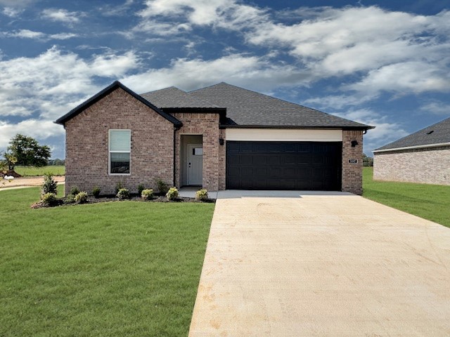 Lovely Lakeway plan in Goose Creek Village, an impressive subdivision where quality and affordability meet in the heart of Farmington. This home features gorgeous quartz kitchen countertops, stainless steel appliances and a walk-in pantry (per plan). 42-inch upper cabinets with top molding and soft close cabinet doors. Private bedroom one includes a lovely en-suite with quartz counter tops, double sinks, walk-in shower, and walk-in closet. Living room will showcase a beautiful modern Electric Fireplace. These homes feature ceiling fans in all bedrooms and living room! Each home exterior will have  brick and Hardie® siding  per plan!  Covered patio(per plan). Garage Door opener! Taxes and Parcel # TBD. Single-story plans feature Luxury Vinyl plank flooring throughout!