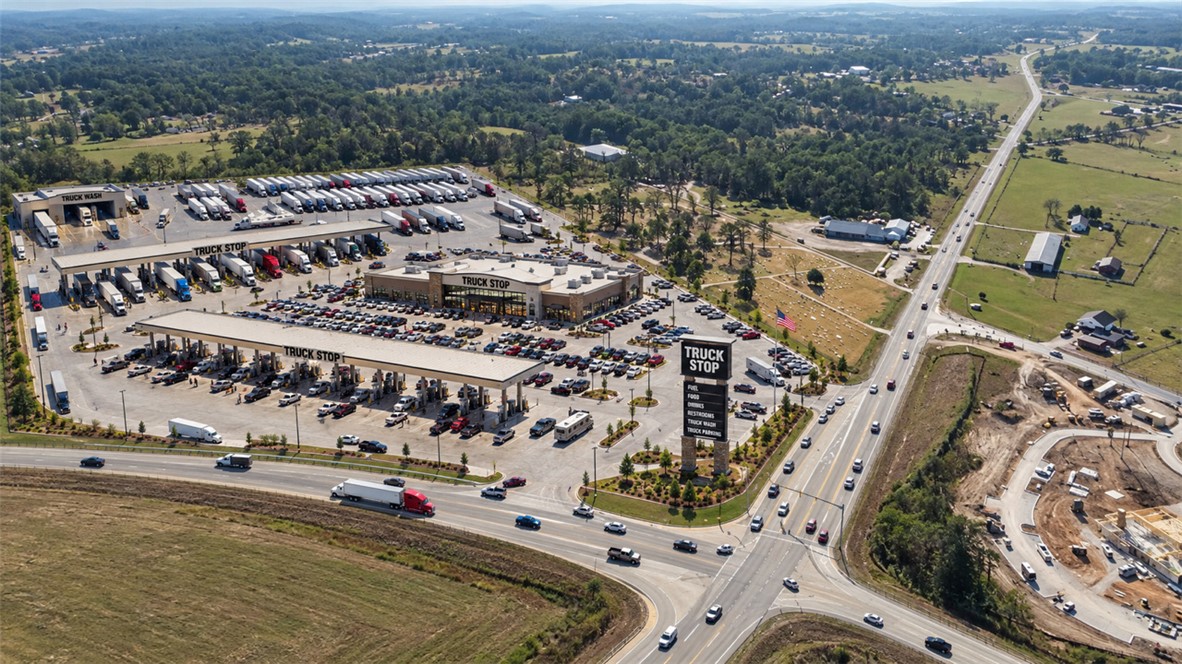 Prime Commercial Opportunity at Exit 100 – Interstate 49

Position your next investment at the center of growth with this 17.56 acres located directly on Exit 100 of Interstate 49—one of Northwest Arkansas’ most highly traveled corridors. Water at street! Sewer on the way from the City of Gravette!

This property delivers the kind of visibility and access developers and investors dream about.

780 feet of on-ramp frontage to I-49

268 feet along Highway 72

1,700 feet of frontage on North Mt. Pleasant Road

Zoned Commercial – ready for development

This site sits in the path of rapid regional expansion, just minutes from the continued growth of Northwest Arkansas. With unmatched access and multi-road frontage, the possibilities are wide open—ideal for retail development, travel center, logistics hub, mixed-use commercial, or investment hold.

Build now or secure your position in the future of Northwest Arkansas