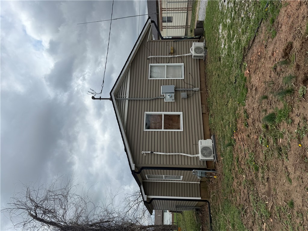 Just minutes from downtown Rogers, this small but charming home is perfect for a first-time buyer or investor. Recent updates include a new roof, gutters, siding, paint, and flooring. The property is currently rented month-to-month for $800 and sits on a lot with potential for future new construction. A great opportunity in a convenient location!
