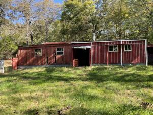 MOBILE HOME IN FAIR CONDITION WOODEDLAND SECLUDED WELL SEPTIC FIREPIT STORM CELLAR CHICKEN HOUSE GOAT SHED FENCED GAZEBO 10 ACRES M/L