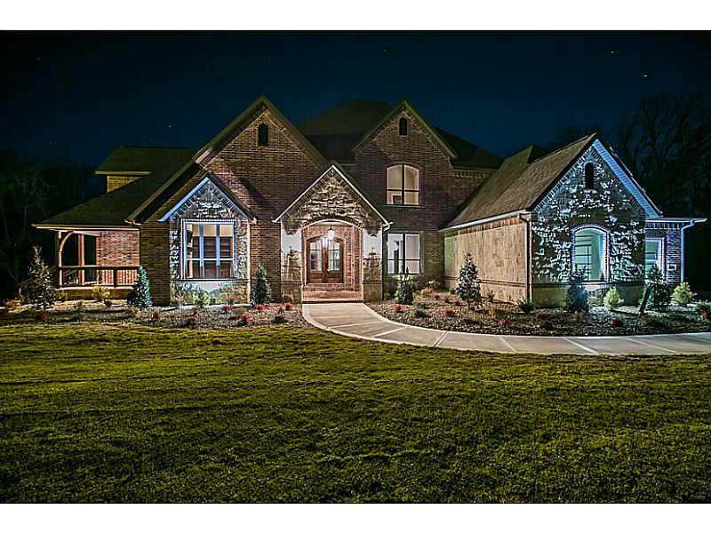 2015 Parade of Homes Showcase Home by Tall Oaks Construction! Luxury Living with over 7341Sq feet on three levels.  Come live large and entertain in style! Gourmet kitchen with double islands and top of the line appliances. Master Retreat w/Coffee Bar &,a Designer Master Closet to Die For! 5BRs, 6 Full Baths. Main level Media Room w/Wet Bar and Opening up to back veranda overlooking private wooded lot. Lower Level perfectly set up for a exercise and hobby areas! Amazing quality and detail throughout!