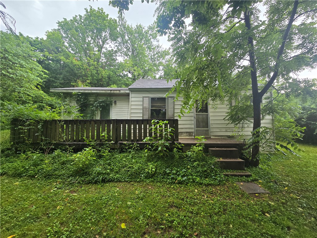 0.37 acre lot in a great location. 2 BR, 1 BA, house needs a lot of work. Built in 1949 with 804 sq. ft. There are 2 detached sheds on the property as well. It sits right behind County Line Liquor. Sold AS-IS, WHERE IS.