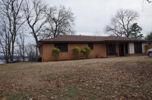 HOME ON THE LAKE ! This 1560 sf home features 3br/2ba. Open concept with split floor plan. A screened in entertainment area/sunroom. A huge new deck for entertaining or just watching the sun set over the water. New appliances ,tile backsplash, new flooring , fresh paint and an OVERSIZED 2 car garage! Approx 1 mi to EFFLUENT BAY ACCESS AREA for great fishing!!