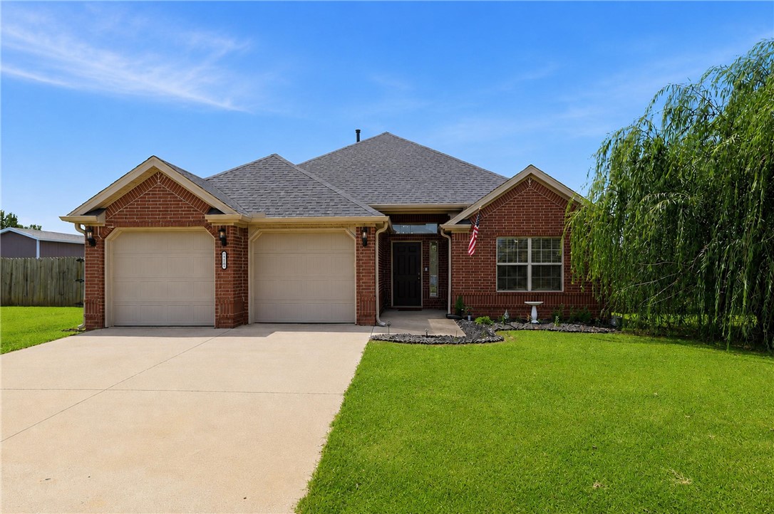 Beautifully maintained all-brick home offering 1,620 sq. ft. of comfortable living with quality finishes throughout. The functional eat-in kitchen features custom alder wood cabinetry, durable 3 cm granite countertops, and plenty of room for gathering. Relax in the inviting living room with a cozy gas fireplace, while easy care LVP flooring and tile extend throughout the home for easy maintenance. The primary suite features a tray ceiling, ensuite bath with double vanity, and a generous walk-in closet. Step outside to a covered patio overlooking a backyard designed for fun and relaxation. The playground set, trampoline, storage shed, and newer 13,000-gallon above-ground pool can all convey. Additional highlights include abundant pull-down attic storage and a brand-new roof installed in 2026. This move-in-ready home is one you won't want to miss!