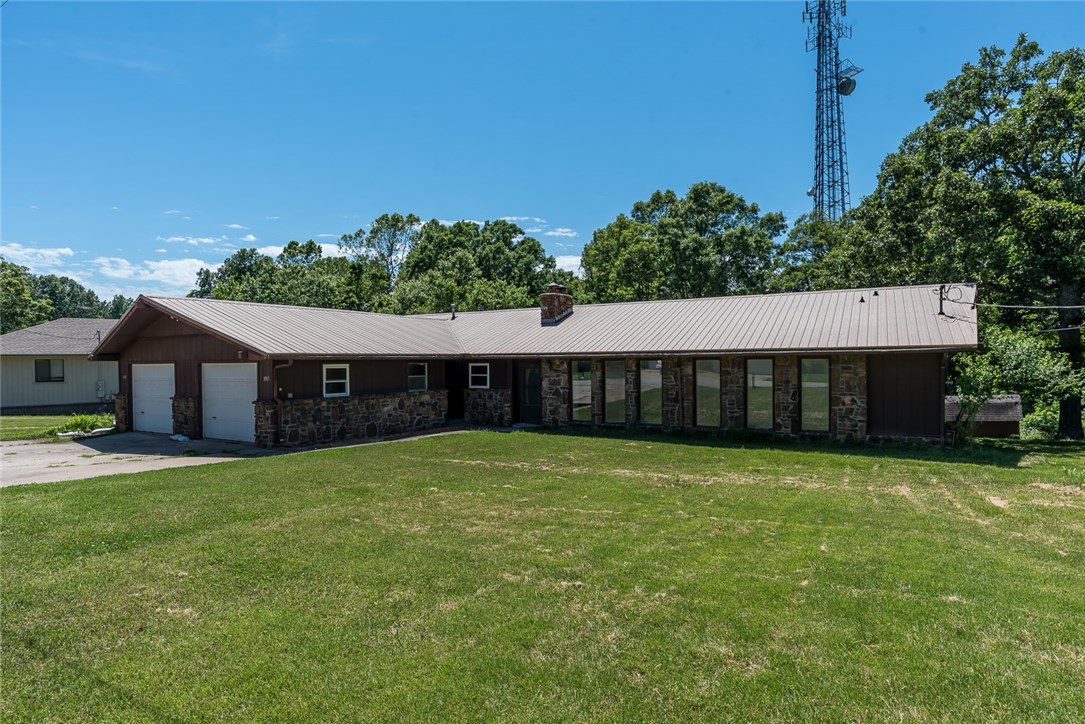 This charming Duplex is Just a short distance to Beaver Lake and Prairie Creek Marina! 3 bed 2 bath on one side and 2 bed 1 bath on the other, both have separate 1 car garage and fireplace in each! one side has new carpet and floors. new HCAB installed 2 years ago! This is a great potential investment property! Call today to schedule your showing!