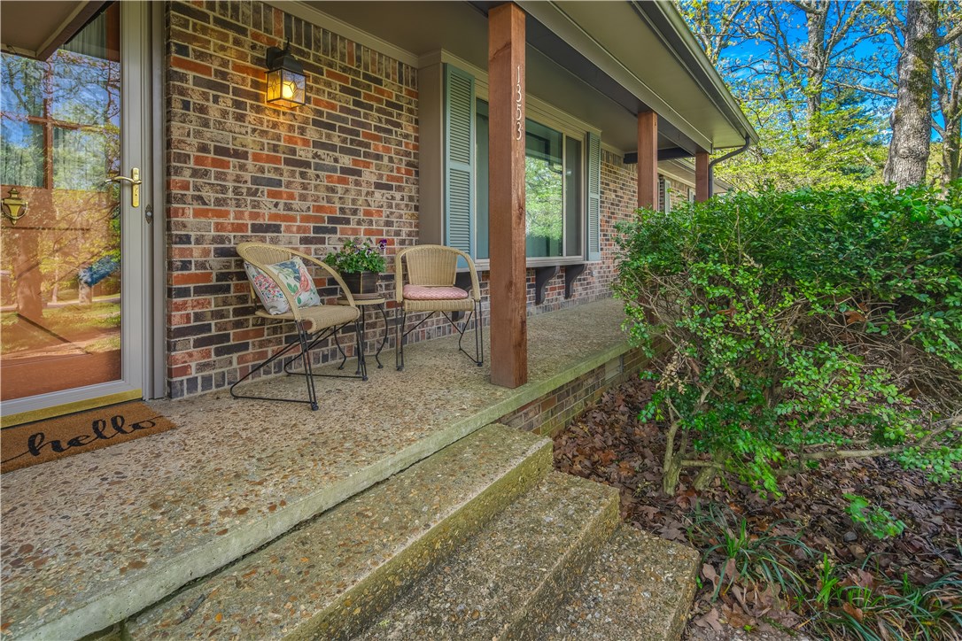 You simply won't believe this home is available!  A huge corner lot with beautiful mature trees right in the middle of the highly-sought-after Rolling Hills area of Fayetteville.  This home is perfect for the growing family with two large living areas, so the kids can hang out together while the grown ups visit.  The large eat-in kitchen can fit a kids' table, too, as the older friends and family enjoy the large formal dining room.  If you need a little privacy, no problem!  Four big bedrooms provide ample alone space, and three full bathrooms mean nobody is banging on the door demanding their turn.  Were you out back and got mud or snow on your shoes?  Just drop them in the mudroom on your way in.  Even Rover loves this home with his own pet door to come and go as he pleases.  The large garage has tons of room for all your bicycles, which you'll be riding the short distance to Butterfield school and the Greenway via the dedicated bike lanes all around the neighborhood.  Act fast! This home is absolutely perfect!
