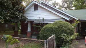 Located close to all amenities is where you will find this charming brick home that will remind you of Grandma's house!!  This 2 bedroom, 1 bath home has a formal dining area for family to gather around.  Outside there is a large front porch for sitting and enjoying the evenings watching cars go by in this quaint little town.