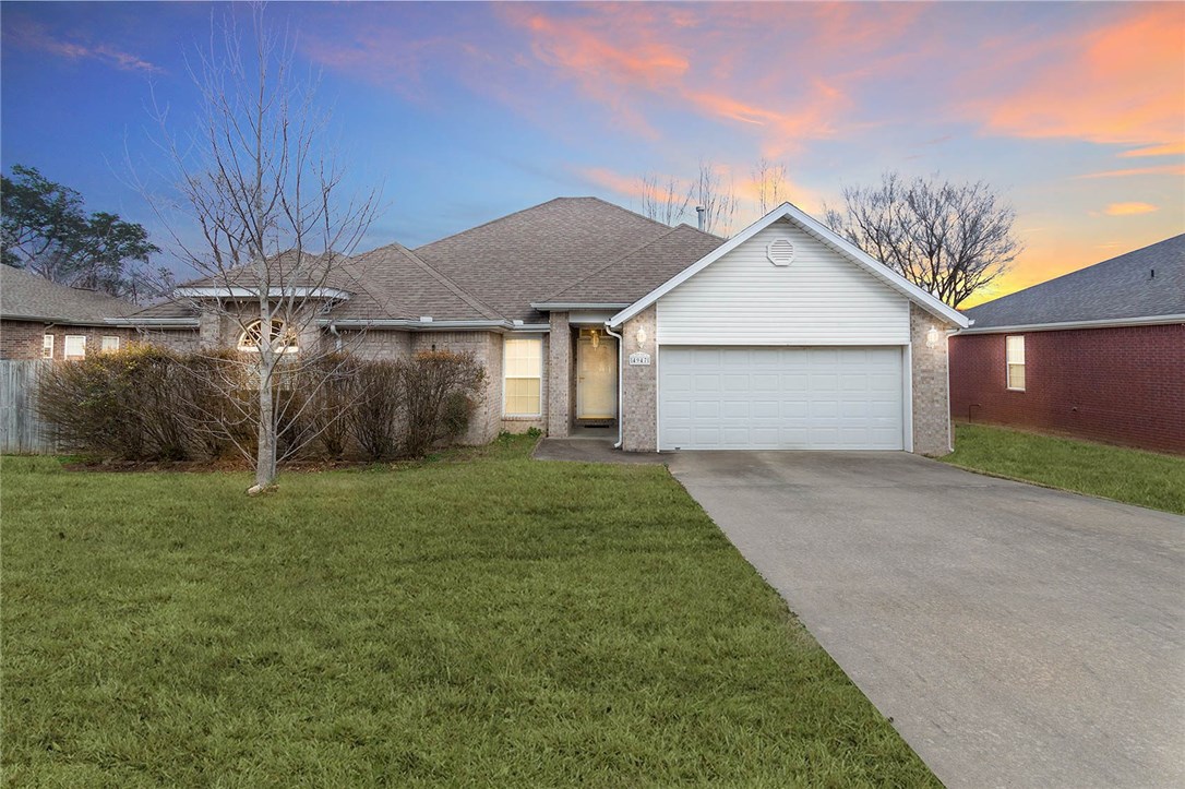 Located about a mile from the upcoming Johnson Square, this comfortable split-plan home gives you and your family the space and lifestyle you need.  Enjoy its central location and easy access to amenities throughout NWA.  Within the neighborhood, take a stroll through the trails; and splash in the community pool in the summer.  In the home, the 5 walk-in closets (3 of which are in master), provide you with plenty of storage.  The master suite also boasts trey ceilings and a whirlpool in the bath.  Tall ceilings and crown molding throughout.  Both eat in kitchen and formal dining.  Relax on your back deck and enjoy the apples, pears, raspberries, and blackberries from your garden.   Zoned for Har-Ber High.  Close to bike trails, N Fayetteville shopping, and urgent care; minutes from I-49 and 71.