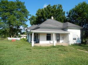 2BR, 1BA home, great rental, large Corner Lot with room for more buildings.