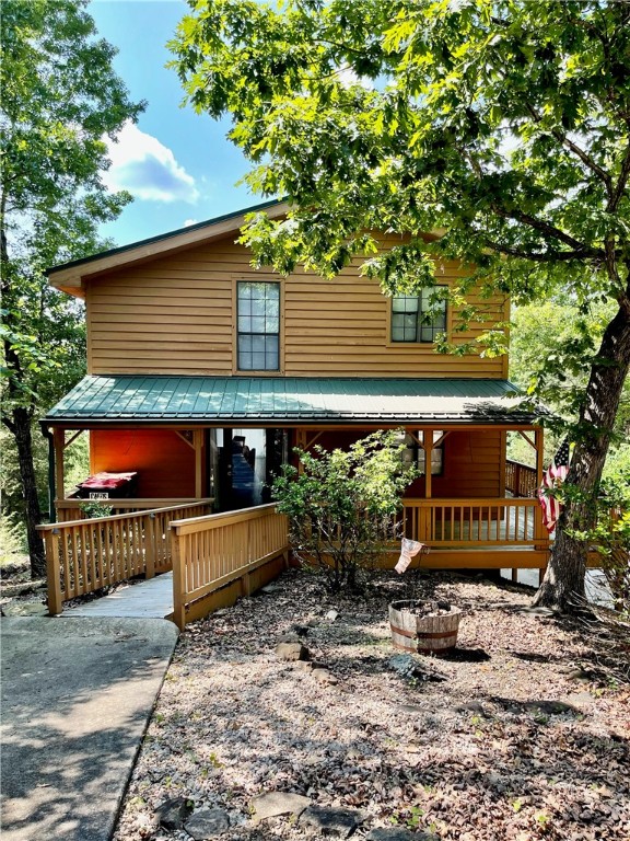 Beautiful lake house on Beaver Lake with a view of Sailboat cove. Newly remodeled interior throughout. Private 2 slip Dock. Low corp line makes it easier to maintain the grounds and keep the view of the lake.