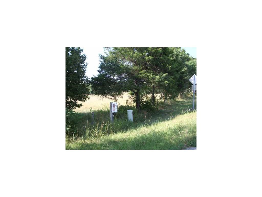 Two lots that are 5 acres each. own 10 acres of mostly level and open land. Some hardwoods, community water is $20.00 a month. Close to Table Rock lake. Enjoy boating, fishing, and swimming. Close to shopping. Animals allowed, horses and cattle.