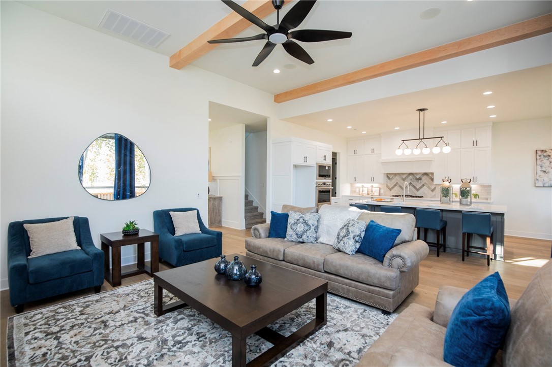Beautifully built home in the gated community of Scissortail with a fabulous layout. Living has a custom tile linear fireplace, custom wood beams and tons of windows letting in the natural light. Kitchen is open to living space and has walk in pantry, huge island, quartz countertops, stainless steel appliances, gas cooktop and double ovens. Spacious master bedroom with accent wall and master bath with tile walk in shower, free standing soaking tub & large master closet. Secondary bedroom on the main level would make a perfect study. Stairs lead to two large bedrooms - All have walk-in closets and a huge bonus room. Large covered back porch overlooks flat, spacious fully fenced backyard. Conveniently located within walking distance of the Bentonville Schools. Scissortail residents have access to TONS of community amenities including gated community, clubhouse, adult pool, family pool, exercise room, playground, firepit and sports court.
