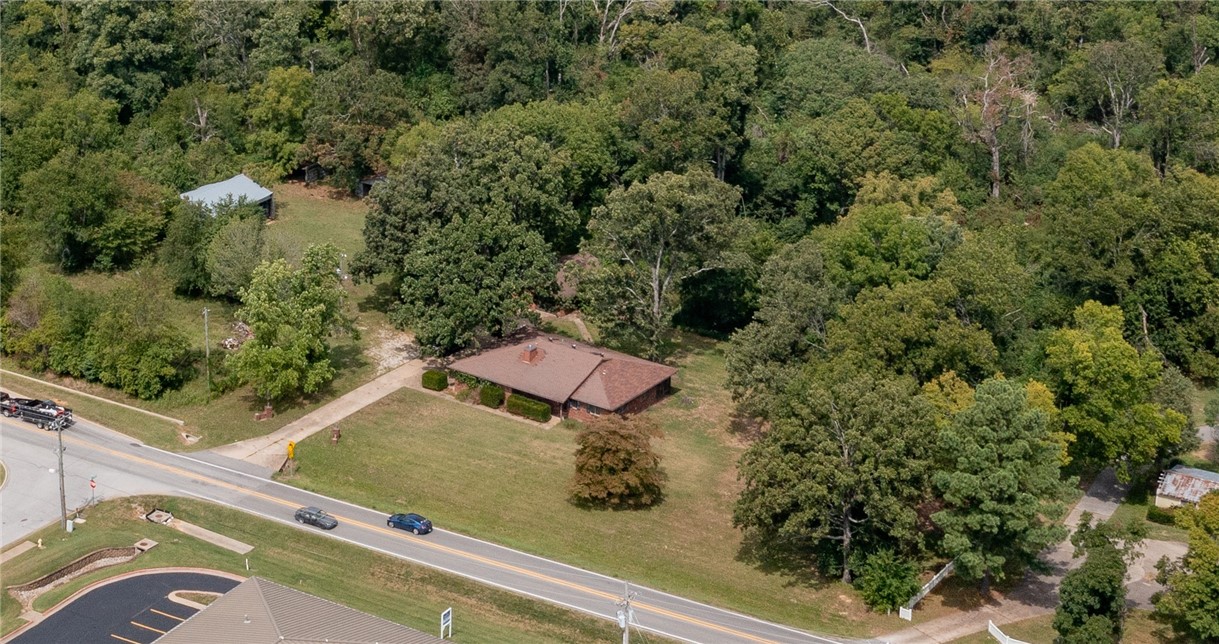 Discover the potential of this 8.81-acre property, ideal for a range of commercial or residential uses. The site includes several storage/pole sheds and a main office or home, providing plenty of functional space. Tenant covers all utilities. Rent is $2,500 per month.