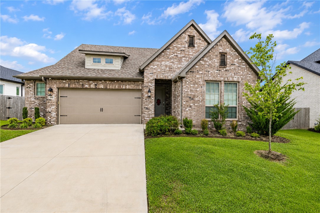 Better than new and move-in ready! This beautifully maintained 3-bedroom, 2-bath home offers 1,824 sq. ft. of thoughtfully designed living space with an open-concept layout, abundant natural light, and quality finishes throughout. The spacious kitchen features a large island, quartz countertops, stainless steel appliances, and ample cabinet space, flowing seamlessly into the living and dining areas—perfect for everyday living and entertaining. The private primary suite includes a spa-like bath and a generous walk-in closet, while two additional bedrooms provide flexibility for family, guests, or a home office. Enjoy the covered back patio and fully fenced backyard, all in a convenient Fayetteville location close to schools, shopping, dining, and easy access to I-49.