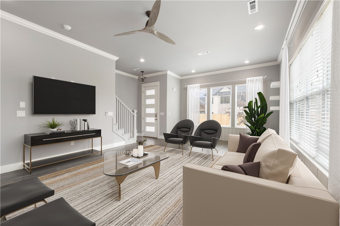 Its time to call THE DISTRICT TOWNHOMES home. Enjoy downtown living in this beautiful townhome just blocks from some of the best restaurants, pubs and shops around. This is an end unit with extra windows and amazing light. It has direct access to the common outdoor dining/grilling area. You will love the designer touches you will find through this home including unique lighting, floating shelves, amazing granite and more. On the main level you will love how open and bright the living room to kitchen is. This townhome feels so spacious. The gourmet kitchen is cozy in size but big on quality. Enjoy professional level appliances, island prep area and a large pantry. When you are ready to relax you can retreat to the oversized primary suite with cozy reading corner (great place for a PELOTON), huge walk in closet and very nice bath area with separate vanities and large shower. There is also a quiet outdoor space off the primary suite. Down the hall you will find two more bedrooms, a full bath and the laundry room.