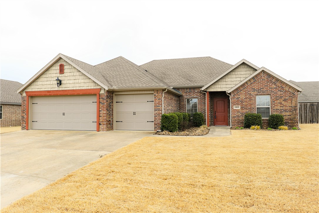 Beautiful four bedroom, three car, three full bath, brick home in Bentonville school district. Granite counters, hardwood floor, new dishwasher, gas stove, pantry. Built in dresser in master closet. Covered patio for backyard entertaining. Well manicured landscape & lawn (professionally treated). Just two miles to the Walmart home office, three miles to the Bentonville square. Close to Bentonville community center.