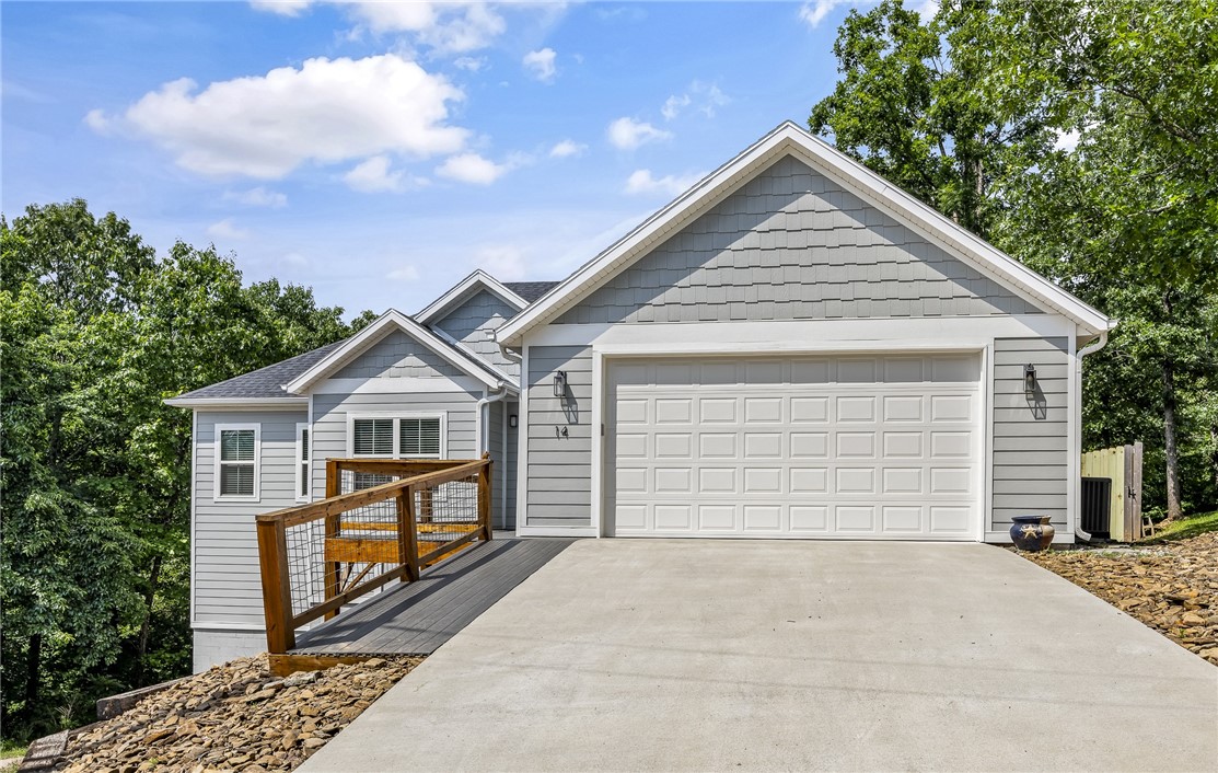 Live where adventure meets comfort! Tucked among the trees near Lake Brittany, this fully furnished home offers the lifestyle that has made Bella Vista a premier destination for outdoor enthusiasts. Ride from your driveway to mnt bike trails, the Greenway, Blowing Springs, Bentonville, and the  bike lift! Hiking, kayaking, and endless natural beauty are all just steps away. This home shows like new. The thoughtfully designed split floor plan provides privacy, while the additional room offers flexibility as an office or bedroom.  Inside, you'll find luxury vinyl flooring throughout, quartz countertops, a lg pantry, and cozy fireplace for relaxing after a day outdoors. The expansive freshly painted deck feels like a private treehouse retreat, perfect for morning coffee or evening gatherings surrounded by nature. Located in Bentonville Sch Dist, this turnkey home lets you unpack & immediately enjoy the very best of Bella Vista!  Once you are here you will truly understand why Arkansas is called "The Natural State."