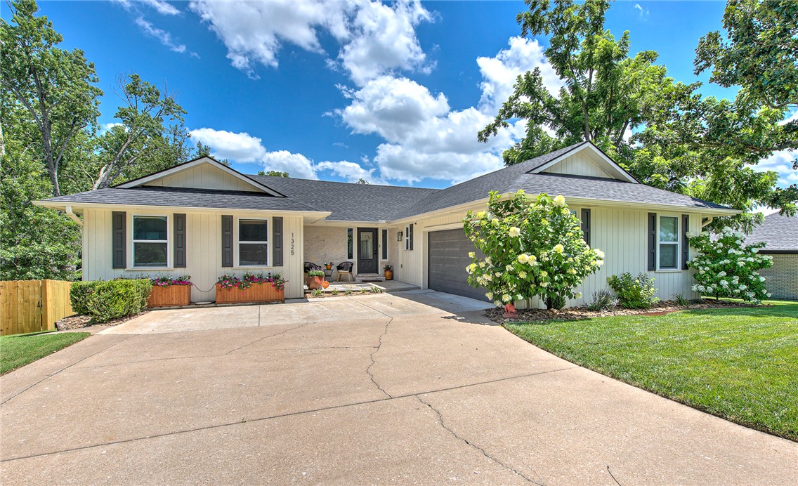 Discover the perfect blend of comfort, character, and location in this beautiful updated home in the sought-after Quail Run subdivision in downtown Bentonville. The heart of the home features a stunning kitchen with soaring vaulted pine ceilings that create a warm, inviting space for gathering. The spacious primary suite offers a spa-inspired bath with a freestanding soaking tub and a generous walk-in closet, while a second main-level bedroom is ideal for guests, family, or a home office. The expansive basement adds exceptional versatility with additional bedrooms, a large living area, and plenty of space for recreation, entertaining, or multi-generational living. Thoughtfully designed with ample storage and walk-in closets, this home is just minutes from Coler Mountain Bike Preserve, Slaughter Pen trails, parks, schools, shopping, and dining. Updates include newer roof, HVAC, carpet, paint, landscaping, and much more- see upgrade sheet. This is a home where every day feels connected to both comfort and adventure.