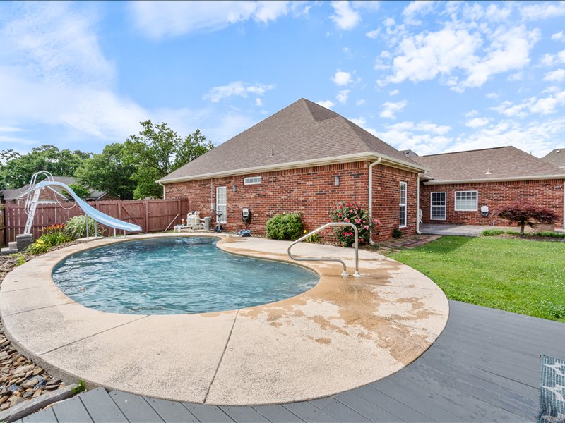 Welcome Home! Come home to this beautifully maintained property tucked away on a quiet cul-de-sac. Step into your own private backyard oasis featuring: Covered patio for relaxing. Extended open patio with a built-in fire pit. Second covered patio with a new pergola. Sparkling in-ground pool is chlorine pool with new slide. The pool & patio are stamped concrete. Outdoor irrigation. Pool storage shed. Inside, you’ll find: 4 spacious bedrooms with a split floor plan, refrigerator & dishwasher replaced in October 2025. Soaring high ceilings and elegant crown molding. Cozy media room with French doors (currently used as a sewing room). Outdoor irrigation system for easy lawn care. Conveniently located just minutes from shopping, restaurants, Hwy 49, Promenade Mall, and local churches — and within walking distance to Bellview Elementary. This home has it all — space, style, and a backyard retreat perfect for guests.