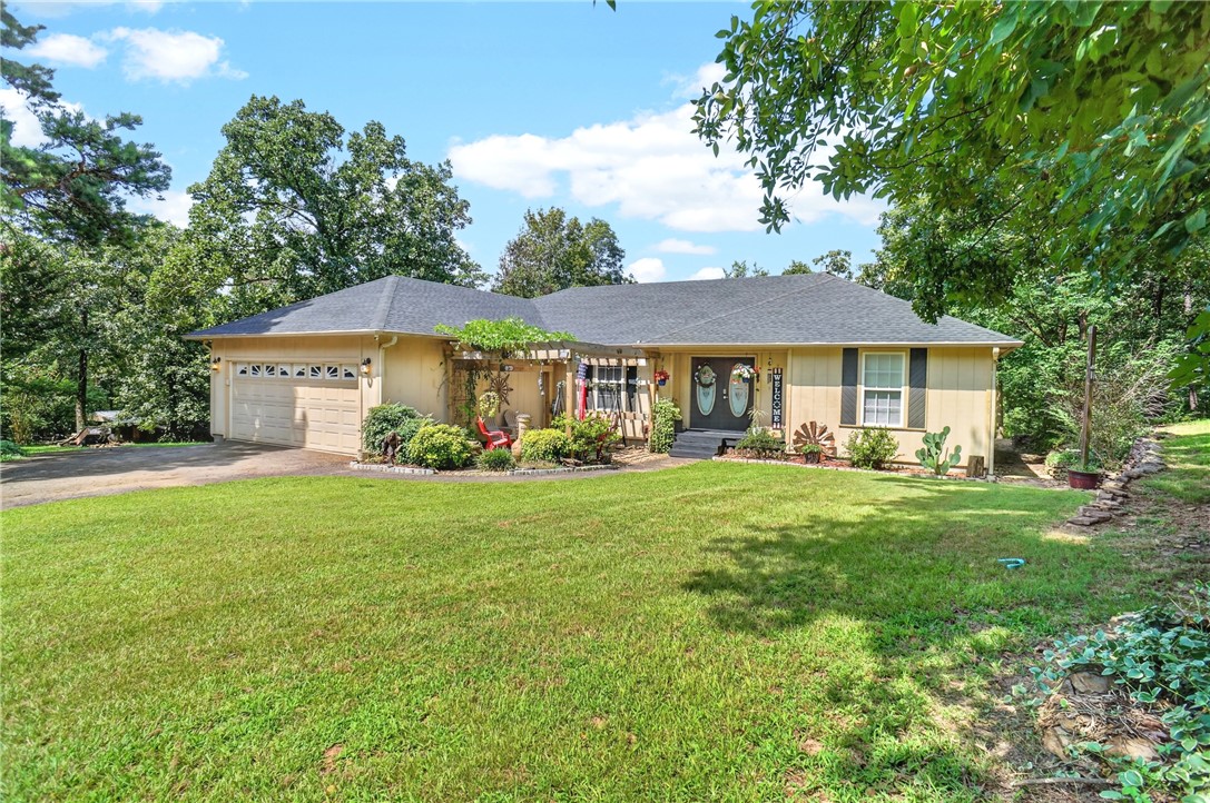 Looking for a nice home that is close to town yet out in the country??  This one is all that and more.  The home itself is just under 1700 sq feet with three bedrooms, two full baths, a large kitchen with breakfast area.  It has a large main bedroom and bath complete with a walkin closet.  Outside there is almost two acres with a great deck and wooded privacy behind the house.  Also the roof and HVAC system are less than 3 years old!   If this checks your boxes you should take a look.