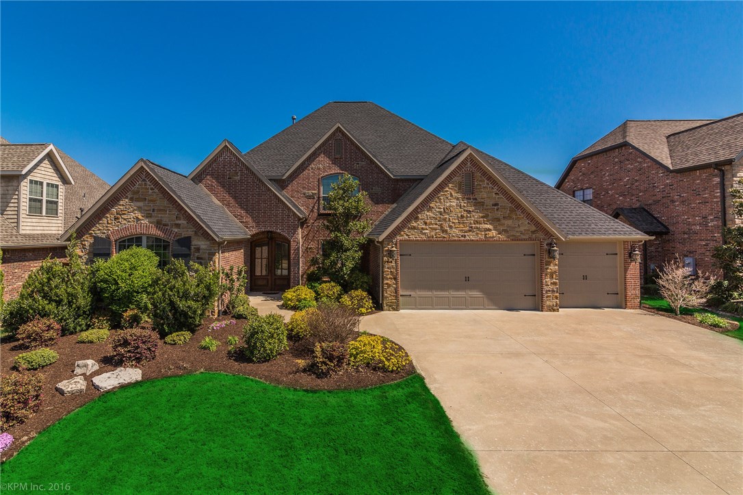 Gorgeous home built by Payne Construction in Bentonville's most popular neighborhood! Classic floorplan with tons of amenities & high-end features, including granite tops, whole-home audio, security system, & central vac. Open plan w/hardwood flooring bathed in natural light. Formal dining room leads to spacious living room with gas floor-to-ceiling fireplace. Kitchen has stainless appliances, walk-in pantry, custom backsplash, & large island. Office has beamed, vaulted ceilings. Master suite with spa-quality bathroom downstairs, and large media room w/ wet bar up. Large bedrooms. Home has plenty of storage. New roof in 2015. Spacious covered patio with fireplace. Amenity rich neighborhood with private pool, sporting courts, and playground.