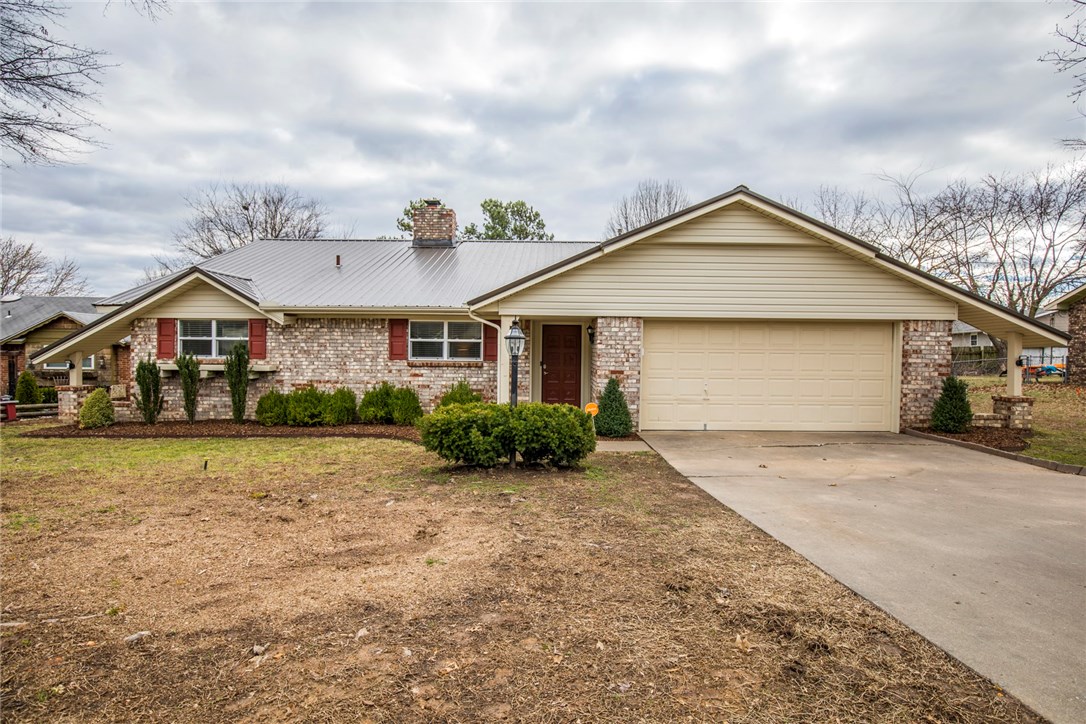 Beautifully updated & move in ready. Home has been well maintained! New Metal Roof and Windows in 2015. Replaced siding, privacy fence, carpet, paint & ceramic tile in 2016. New attic insulation in 2019 after energy efficiency test was run. Warm up by the wood burning fireplace in the winter and then enjoy summers in the gazebo next to the backyard pool - new pump installed 2016/liner replaced 2015. Fantastic location in a well established Springdale neighborhood in Har-Ber High School district.