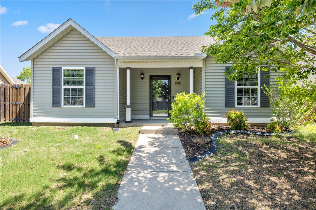Step inside this well maintained home that is central to all Fayetteville has to offer.  A half mile from Mt. Kessler Park, less than two miles to Centennial Park, less than four miles to Razorback stadium and steps from Holland Park, this home provides easy access to numerous outdoor gathering areas in Fayetteville.  This cozy home is cute and ready for its next owner to make it their own.  The thoughtful layout allows for each bedroom spaced where they share no walls and open up to the middle of the home meant for gathering.  The rear entry garage create privacy that the homeowner will love.    A new water heater in 2025 and new HVAC in 2022 make this home even more appealing.  Whether you are an investor, student, first time home buyer or looking to downsize don't miss out on this cute home that has so much to offer.