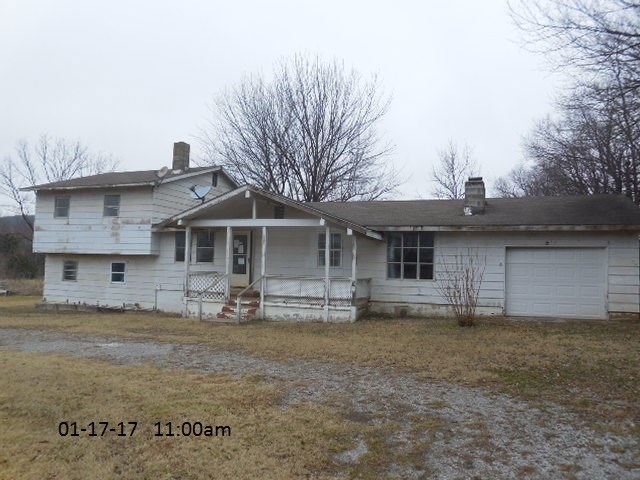 Tri-level home with 4 BRs , 2 BA + Family Room and single garage on 6 acres. All electric, some newer carpet & Kitchen has newer cabinets. Large Living / Dining combination. 2 laundry areas. There is a pole barn with metal siding/roof. Mostly level land and only approx. 3 miles to I49. There is a Creek behind property. See attachment for PAS requirements and WFHM offer submittal information in MLS document section. Please submit all offers to the listing broker/agent.