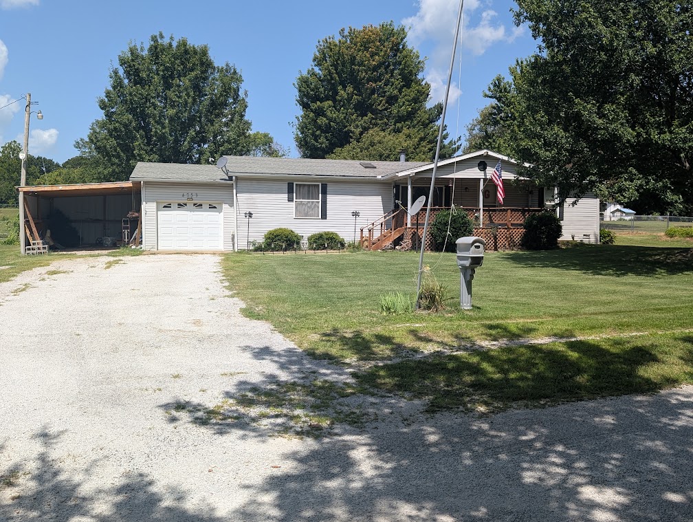 Affordable country living on 1.19 acres M/L just minutes from Harrison! This well-maintained mobile home offers peaceful surroundings with plenty of room to enjoy the outdoors. The property features a spacious glass-enclosed sunroom, open front porch, wood decks, attached carport, concrete driveway, storm shelter, and two storage buildings, providing exceptional space for hobbies, tools, and equipment. Mature shade trees create a beautiful setting, while the level yard offers room for gardening, pets, or outdoor entertaining. Located in the desirable Valley Springs area, this property combines privacy with convenient access to schools, shopping, and local amenities. Whether you’re looking for a primary residence, investment property, or peaceful retreat, this property offers excellent potential and value. Schedule your private showing today!
