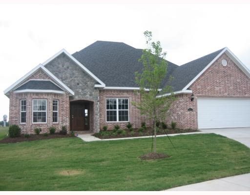 Home in upscale neighborhood close to shopping. Community pool.