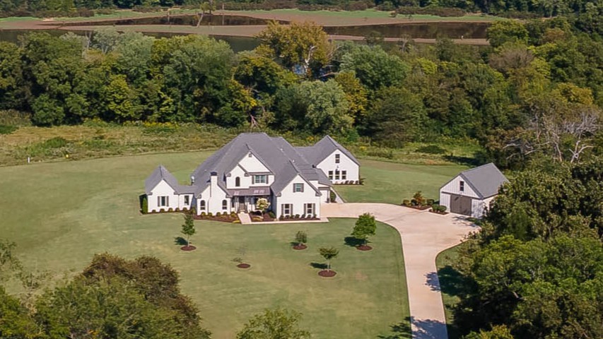 Amazing ESTATE style home situated on 6.05 manicured acres that abuts the WHITE RIVER at the end of a private gated street! The MAIN house offers 5,205 sq ft, 4 bedrooms, 3.5 full bathrooms, open eat in kitchen, formal dining, study, bonus room, separate laundry, TWO primary closets and a home gym. The POOL house has 750 sq ft which includes super fun living space, beverage refrigerator, serving station, and a full bathroom. Amenities include an in-ground heated saltwater POOL, whole house generator, SPORTS COURT, outdoor living with built-in grill/refrigerator/radiant heating, Sonos surround sound inside and out, commercial grade epoxy floors, dog wash, and MORE. Home was built in 2019 and then partially remodeled in 2022. Don’t miss the 25 x 30’ DETACHED garage. This property is truly REMARKABLE!!