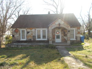 This is a very cute rock home with a fenced in backyard very nice kitchen oak kitchen cabinets Central gas heat and airpartial unfinished basement. upstairs has 2 bedrooms nice size living room and master bedroom  1109 sq  ft level lot