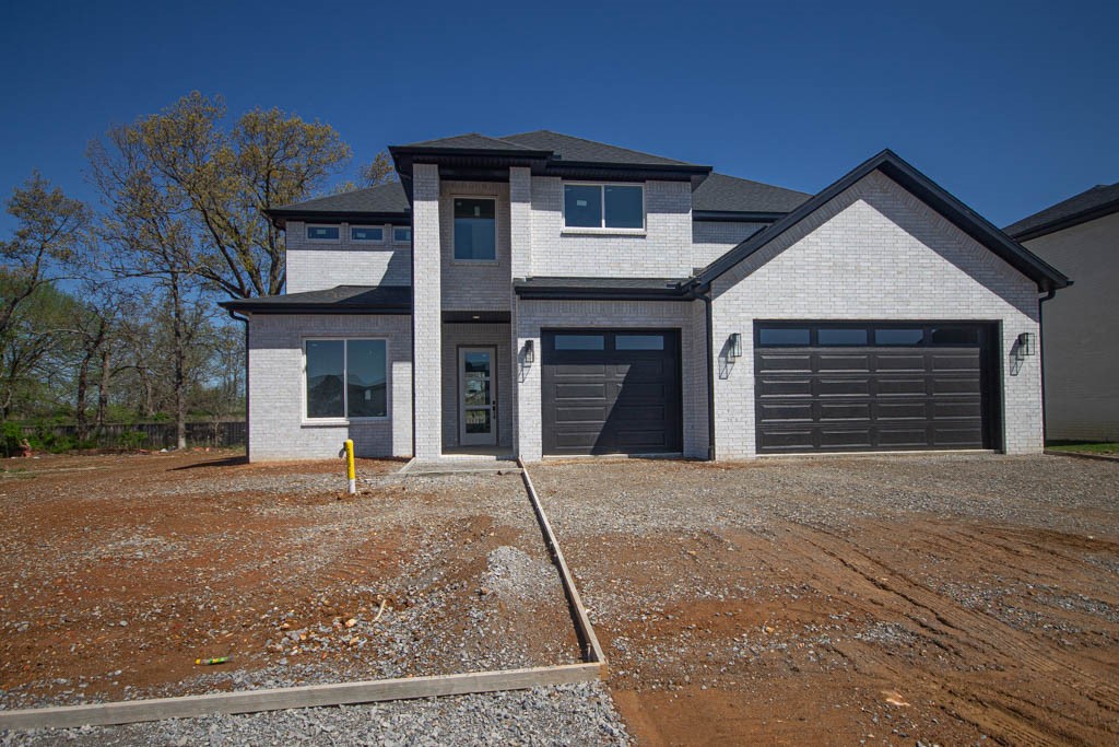 New construction modern home with gorgeous exterior in sought after gated community of Scissortail. Enjoy the stunning living room with custom beams, tiled linear fireplace, tons of light streaming through ample amount of windows and open floorplan. Kitchen features large island, stainless steel appliances, gas range, quartz countertops, double ovens, walk in pantry and storage! Home also features 5th bedroom on the main level that could also work as a study. Spacious, private master bedroom with luxurious master bathroom. Master bath with double sinks, storage, walk-in tile shower and soaking tub. Upstairs features three large bedrooms and large bonus room with wet bar. Huge covered patio with landscaping perfect for entertaining!