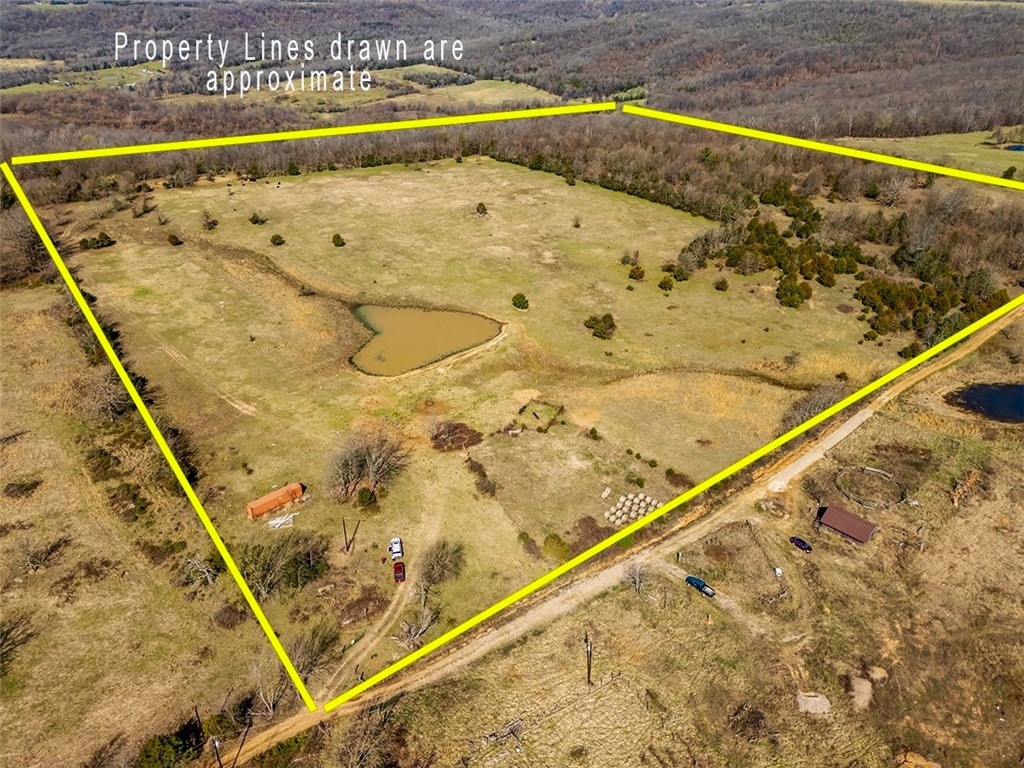 37.82 Acres of Prime Pastureland with expansive, scenic Views! Looking for the perfect piece of land for your livestock or dream home? This property offers a beautiful, well-maintained pasture with the following key features: A fully fenced perimeter for livestock, fertilized and sprayed yearly for optimal pasture health, a large pond providing a reliable water source, corral with squeeze chute for easy handling of cattle, and timber along the edges providing beauty, shade and protection. This property also makes it easy to build your dream home with electric and rural water already on-site. Showings by appointment only, so call today to see this beautiful property!